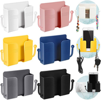 Vente en gros en usine Accessoires de téléphone Support adhésif pour téléphone portable Boîte de rangement pour télécommande Support mural multifonction
