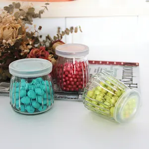 wholesale new line design round storage spice seasoning candy honey glass pudding bottle glass spice jar airtight plastic lid