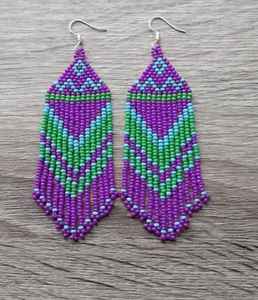 Pendientes colgantes de cuentas de arroz de moda de estilo bohemio Cuentas de semillas de borla larga geométrica colorida para ocasiones de fiesta - Product Image 1