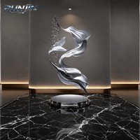 Sculpture en acier inoxydable, art métallique abstrait, ruban fluide infini, moderne, centre ouvert, poli miroir, grande taille, sur mesure par le fabricant