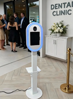 Photomaton ovale moderne réglable en hauteur compatible avec les appareils photo reflex et les iPad, avec support d'imprimante