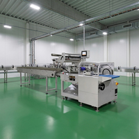 Machine d'emballage industrielle automatique SZ-750W pour sachets coussin, 25-60 sachets/min, pour produits surgelés en usine, avec plateau, pour l'emballage de rouleaux de printemps