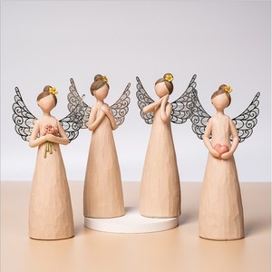 Ensemble de statues d'anges nus en résine Etechan, 4 ailes en dentelle tenant un bouquet de fleurs, décoration d'intérieur - Product Image 1
