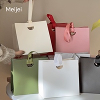 Sac cadeau haut de gamme pour petits bijoux avec poignée en ruban, emballage spécial en papier pour souvenirs, bijoux, montres et lunettes