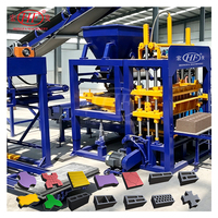Machine de fabrication de blocs de béton QT4-15C à économie d'énergie pour une production de 7000 à 10000 blocs creux par jour sur site