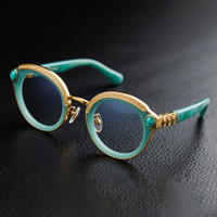 Lunettes en acétate faites à la main OEM avec incrustation turquoise et détails plaqués or, montures de lunettes de luxe pour femmes et hommes