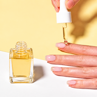 Produits de soin des ongles biologiques en gros personnalisés : Huile-sérum pour ongles et cuticules, hydratante, apaisante, réparatrice, fortifiante et stimulante de la croissance, avec compte-gouttes
