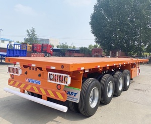 Semi-<span class=keywords><strong>remorque</strong></span> à plateau plat en acier de 40 pieds à 3 essieux, utilisée pour le chargement de marchandises <span class=keywords><strong>sur</strong></span> des camions de transport de conteneurs portuaires - Product Image 1