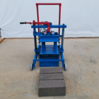 Machine manuelle de fabrication de briques 2-45 à entretien facile pour la construction routière, la construction de trottoirs et les logements ruraux