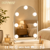 Miroir de maquillage blanc arqué de style Hollywood avec sept ampoules et cadre en U inclinable, miroir de vanité de table avec icônes tactiles
