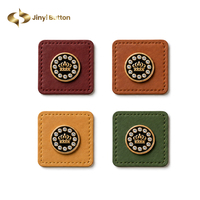 Étiquettes en cuir personnalisées Jinyi OEM ODM avec logo métallique, à coudre sur les vêtements, patchs en cuir pour hijab