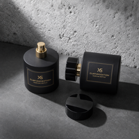 Flacon de parfum en verre noir mat de luxe 50ml 100ml, flacon de parfum vide avec logo personnalisé, estampage doré pour commande d'échantillon
