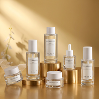 Desain Baru Ramah Lingkungan Dapat Disesuaikan 15ml 50ml Botol Pompa Tetes Minyak Esensial Kaca Silinder Bening Dasar Tebal Serum Lotion