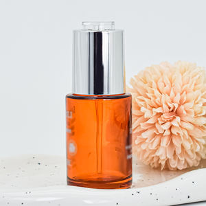 Botella redonda con cuentagotas para el cuidado de la piel, 30mL de suero, Color naranja, vidrio, cosméticos, aceite de hombro plano, con prensa de plata - Product Image 1