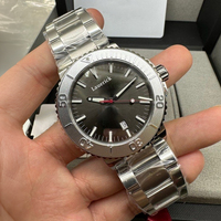 Montre automatique de sport de luxe décontractée avec lunette rotative en forme d'engrenage, cadran gris foncé brossé soleil et bracelet massif poli