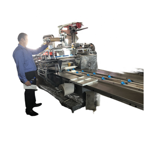 Macchina confezionatrice di guanti chirurgici in lattice completamente automatica macchina confezionatrice di tamponi di garza - Product Image 2