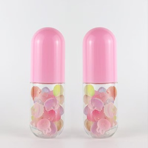 Nouveau design 60ml capsule <span class=keywords><strong>forme</strong></span> <span class=keywords><strong>bleu</strong></span> <span class=keywords><strong>rose</strong></span> clair <span class=keywords><strong>bouteille</strong></span> corps coloré bouchon <span class=keywords><strong>bouteille</strong></span> <span class=keywords><strong>en</strong></span> plastique pour bonbons alimentaire emballage conteneur - Product Image 1