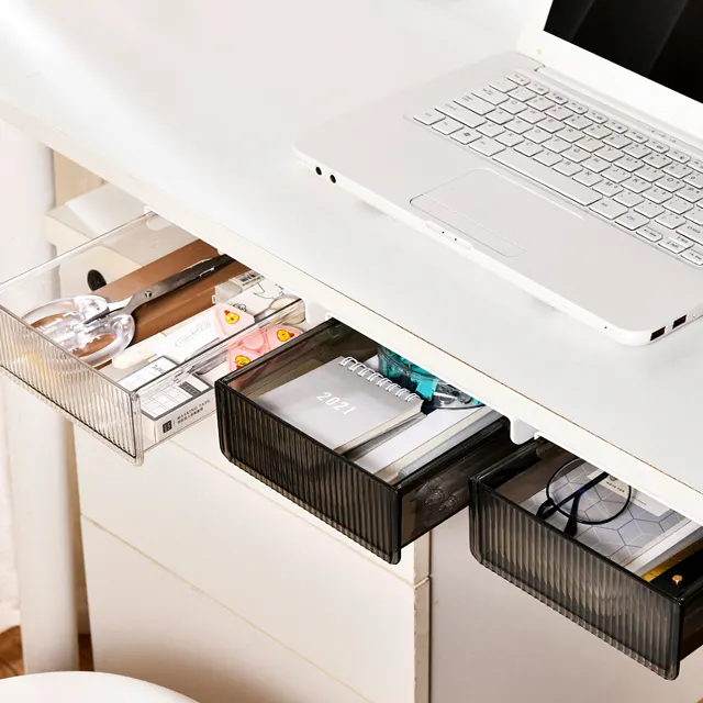 Unter Schreibtisch versteckt Selbst klebender Schubladen-Organizer Schieben Sie die aufsteck bare Schreibtischs chu blade heraus
