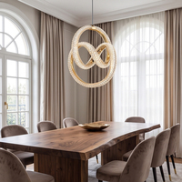 Lustre moderne de luxe en cristal doré avec anneaux entrelacés, luminaire suspendu LED pour escalier et salle à manger