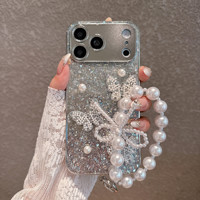 Coque de téléphone papillon scintillante de luxe pour iPhone 17 Pro Max 16 15 14 Plus 13 12 11 avec dragonne perlée et chaîne de téléphone à nœud