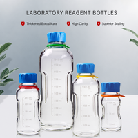 Bouteille de réactif chimique graduée transparente en verre borosilicate ergonomique avec bouchon à vis bleu GL45, personnalisée OEM pour laboratoire médical, vente en gros