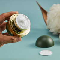 Pot cosmétique PP vert foncé en forme de boule de 50ml avec bouchon à vis vert et joint de traction à la main Conteneur de luxe pour soins personnels de la peau