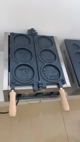 Commerical nouvelle machine à gaufres de pièces de monnaie 4 pièces machine à gaufres de forme ronde adaptée à l'équipement de collation