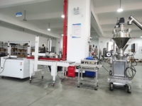 Máquina de llenado semiautomática de detergente en polvo de 5kg y 10kg para proveedores personalizados, con motor de grado alimenticio para bolsas/bolsas de fábrica.