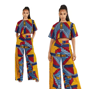 Crop top court dévoilant le ventre, pantalon droit ample, ensemble coloré à manches courtes et col rond, vente en gros directe usine - Product Image 1