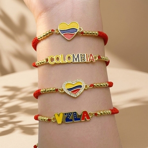 Pulsera de la Amistad BM3032 con Dije de <span class=keywords><strong>Corazón</strong></span> de Bandera Patriótica Esmaltada de Colombia y Venezuela, Cuerda Roja de Macramé, Edición Fútbol 2026 - Product Image 1