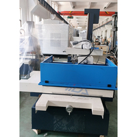 Machine de découpe à fil EDM CNC DK7763 de haute précision avec armoire de commande verticale et moteur PLC