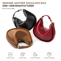 Sac croissant d'épaule en cuir véritable pour femme, style luxe discret, texture Napa lisse, sac lune, en stock, marque privée, logo ODM