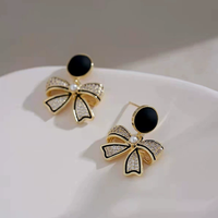 Haut de gamme nouveau élégant élégant argent aiguille noir rond cubique Zircon arc boucles d'oreilles femmes mode strass diamants arc boucles d'oreilles