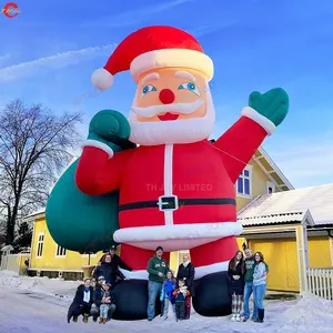 Envío de puerta gratis 2024 Año Nuevo Papá Noel inflable gigante con bolsa de regalo Publicidad de Navidad Inflables llamativos