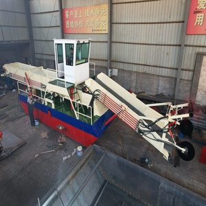 Rivierreinigingsmachine verzamelt drijvend afval, maait waterplanten en snijdt riet. - Product Image 2