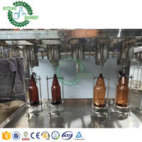 Semi auto 500B/H à 1000BPH 650ml aluminium bouteille ca p 2 4 tête buse boissons gazeuses machine de remplissage