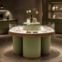 Großhandel Luxus-Schmuckvitrine LED-Beleuchtete Gehärtete Glasvitrine Anpassbare Edelstahl-Schmuckmarke Ausstellungsraum