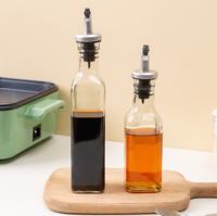Bouteille d'huile en verre multifonctionnelle de 250 ml avec couvercle en plastique et bec verseur, conteneur de rangement carré moderne de qualité alimentaire pour épices, idéal pour la cuisine