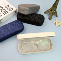 Les derniers étuis à lunettes rigides haut de gamme en métal et étuis optiques de la marque Shiny, en gros et personnalisés, les plus vendus