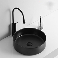 Lavabo rond de salle de bains de comptoir coloré de surface vitrée en céramique directe d'usine