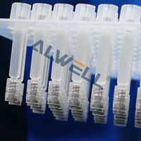 Machine automatique de remplissage et de bouchage de seringues RTU pour liquides et gels, destinée aux cosmétiques et à l'esthétique