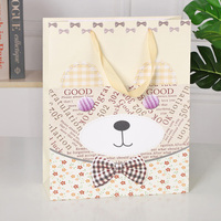 Customized Wholesale Classic Recycled Paperboard Craft Gift Packaging Bags Cute Animal Christmas Pattern Offset Printed Ribbon