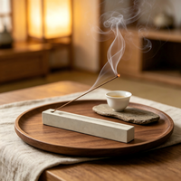 Brûleur d'encens artisanal en pierre texturée, design long et élancé, décoration zen pour espace de méditation, ornement de table pour salle de yoga