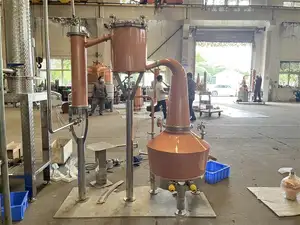 Großhandel individueller Kupfer-Säulen-Gin-Destilliergerät Heim-Mini-Kupfer-Gin-Korb-Destilliergerät