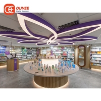 Présentoir de sol pour entrepreneur en aménagement de magasins, design intérieur de pharmacie, présentoir lumineux en plexiglas pour magasin de médicaments