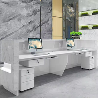 Bureau d'accueil moderne effet marbre avec LED encastrées et logo personnalisé pour hall d'hôtel et bureau d'entreprise