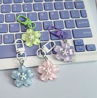 Porte-clés romantique en gelée motif fleur de cerisier, mignon et féminin, en résine plastique translucide, breloque de sac à motif de pétales de fleurs, pour couple et meilleure amie