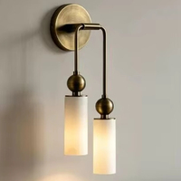 Lampe murale de fond de salon en albâtre de style minimaliste américain, lampe murale de chevet de chambre en marbre de designer espagnol, vente en gros