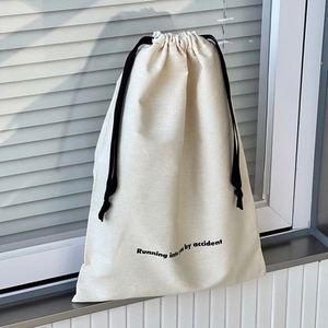 Grande pochette cadeau en toile certifiée GOTS, sac anti-poussière en coton biologique naturel recyclé avec ruban noir - Product Image 1