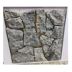 Rivestimento interno delle mattonelle della parete di pietra dell'interno irregolare allentato grigio chiaro del calcare interno